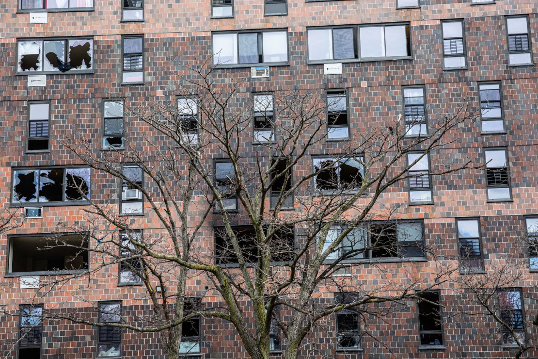 Broken windows are signs of the deadly fire which swept through this residential apartment building in the Bronx.