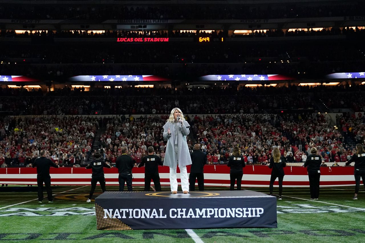 Natalie Grant sings the National Anthem  during the pregame festivities.