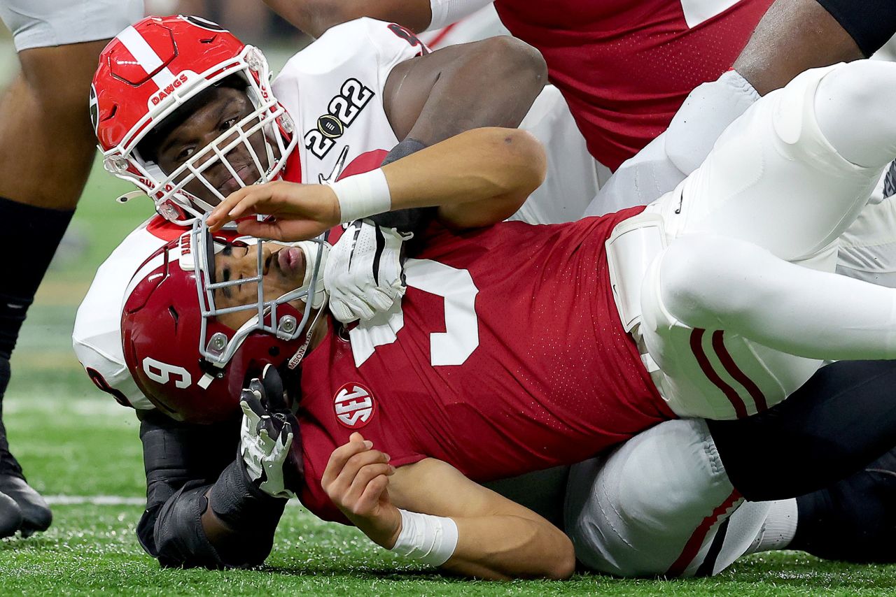 Georgia's Jordan Davis sacks Young on the game's opening drive. It was first ruled a fumble that Georgia returned for a touchdown. But replay reversed the call, and it was determined to be an incomplete pass instead.