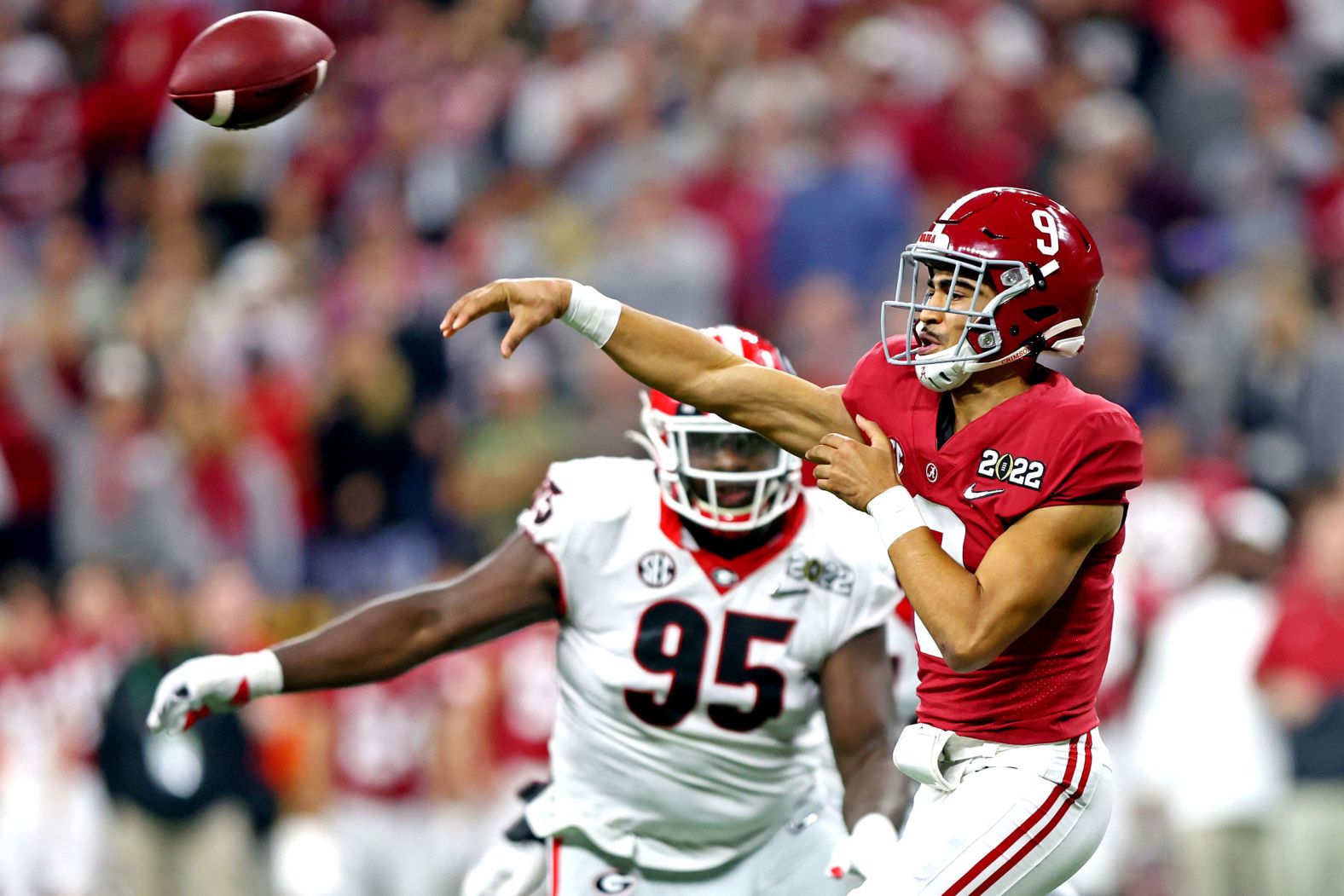 Young throws a pass during the first half.