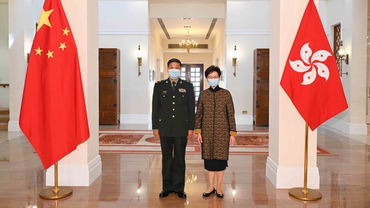 Hong Kong Chief Executive Carrie Lam, right, meets the commander-in-chief of the Chinese People's Liberation Army Hong Kong Garrison, Maj. Gen. Peng Jingtang, at Government House in Hong Kong on Monday.