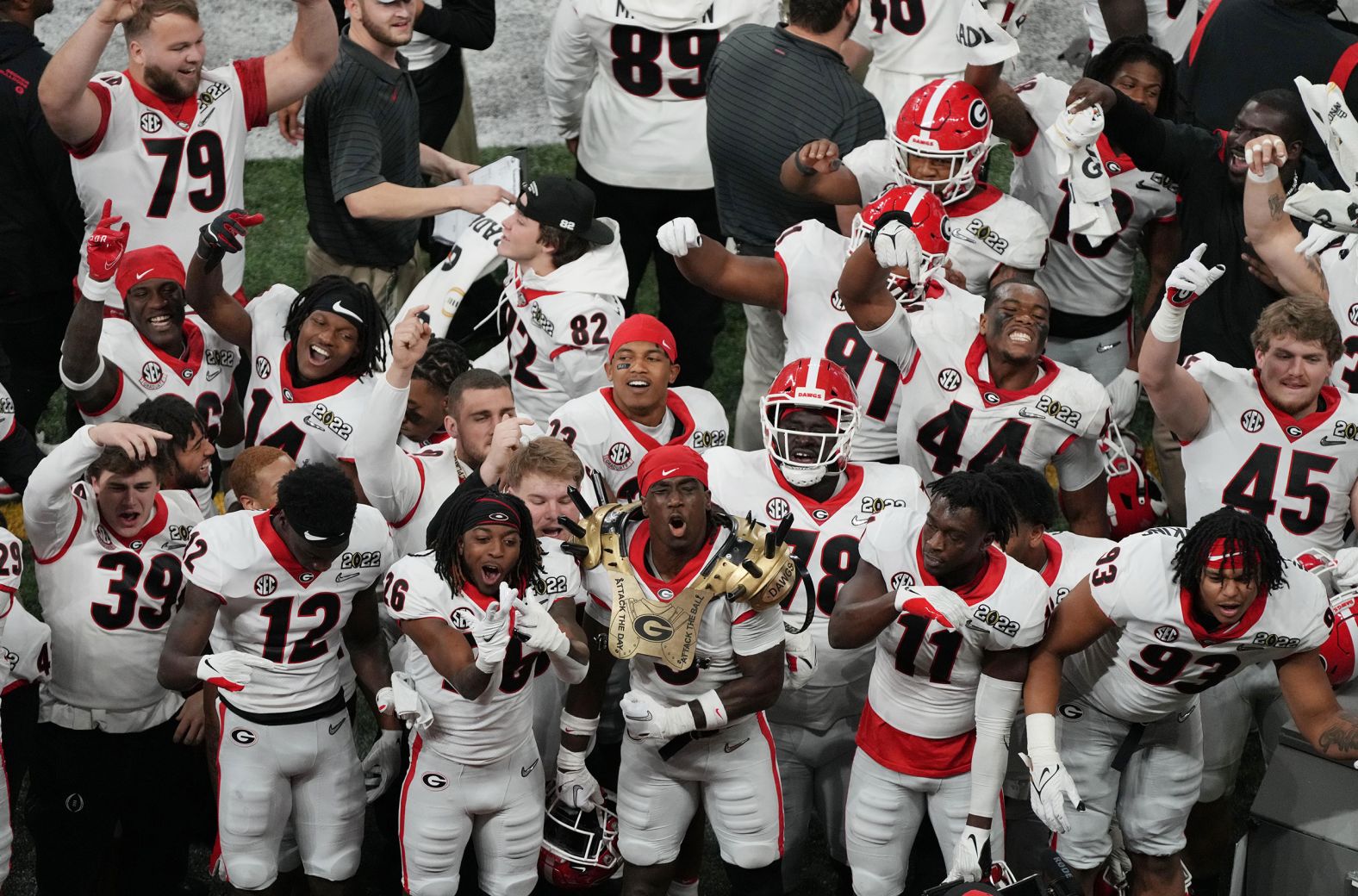 Georgia players celebrate on the sideline late in the game.