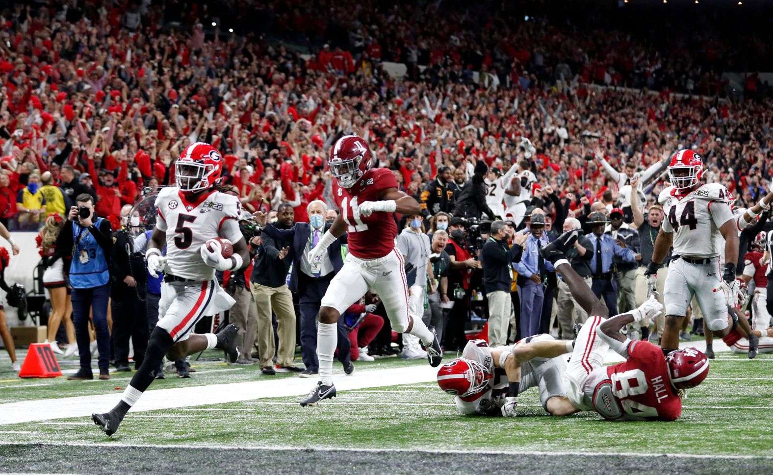 Ringo runs into the end zone after his pick-six.