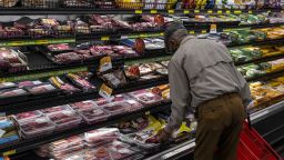 A customer shops in the meat aisle of a store in San Francisco, California, U.S., on Thursday, Nov. 11, 2021. 