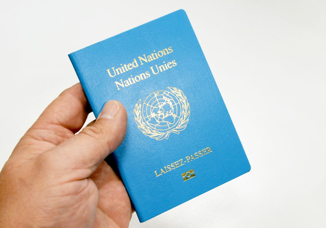 The UN's blue "'Laissez-Passer" travel document.