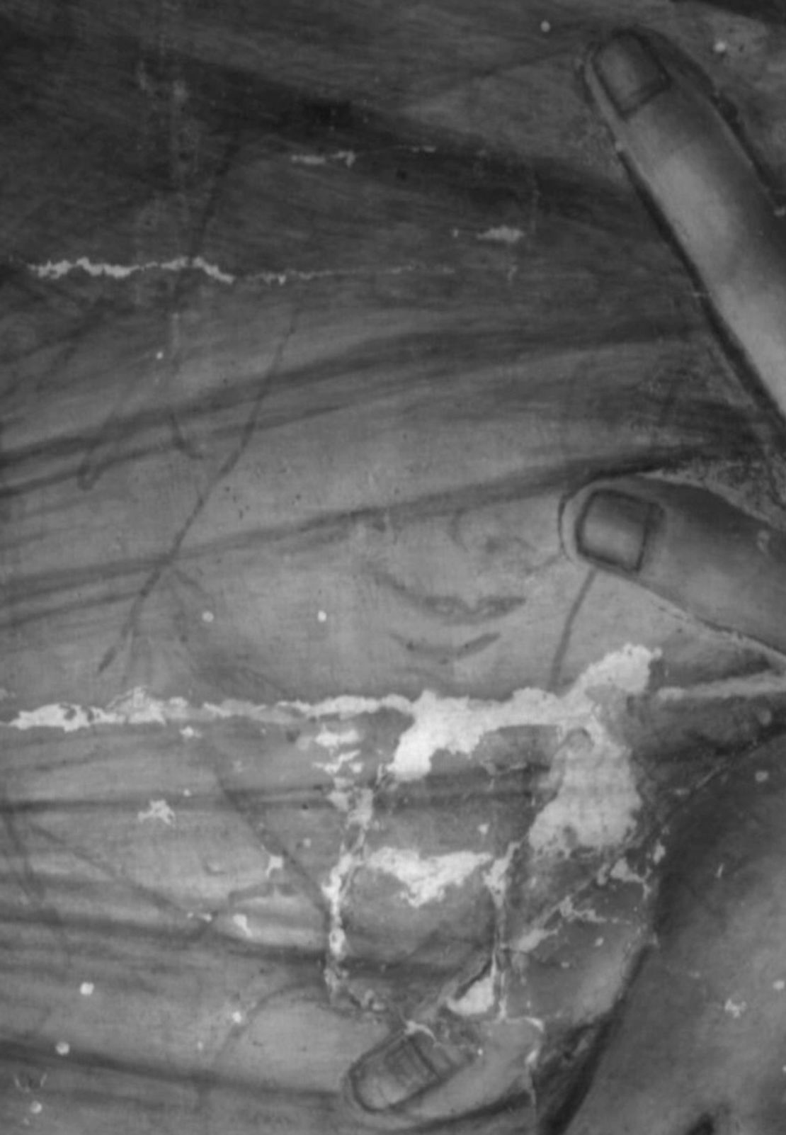 The face of the Christ Child (rotated upright for clarity) is visible in the infrared image.