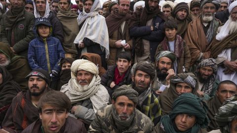 Hundreds of Afghan men gather to apply for the humanitarian aid in Qala-e-Naw, Afghanistan, Tuesday, Dec. 14, 2021. In a statement Tuesday, Jan. 11, 2022, the White House announced $308 million in additional humanitarian assistance for Afghanistan, offering new aid to the country as it edges toward a humanitarian crisis since the Taliban takeover nearly five months earlier. 