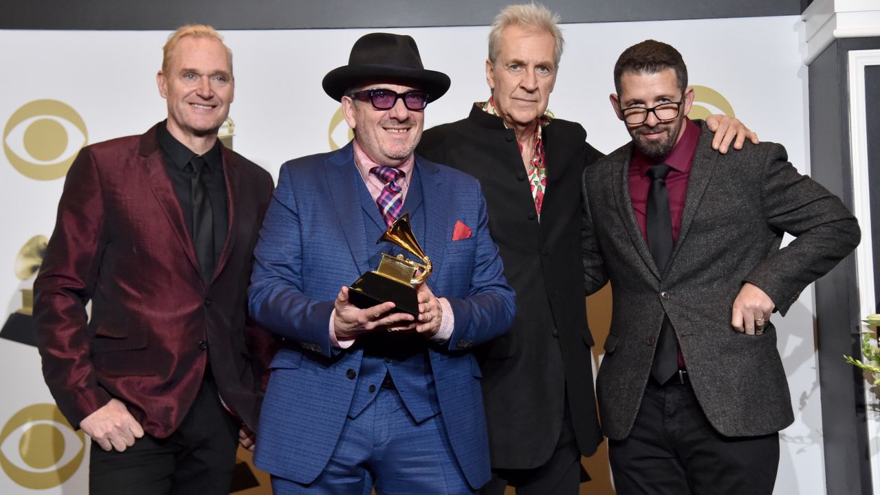Elvis Costello & The Imposters (from left: Davey Faragher, Elvis Costello, Pete Thomas and Sebastian Krys) are shown at the 62nd Annual Grammy Awards at LA's Staples Center on January 26, 2020. 