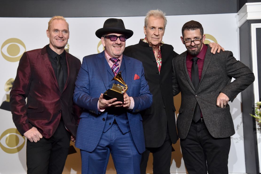 Elvis Costello & The Imposters (from left: Davey Faragher, Elvis Costello, Pete Thomas and Sebastian Krys) are shown at the 62nd Annual Grammy Awards at LA's Staples Center on January 26, 2020. 