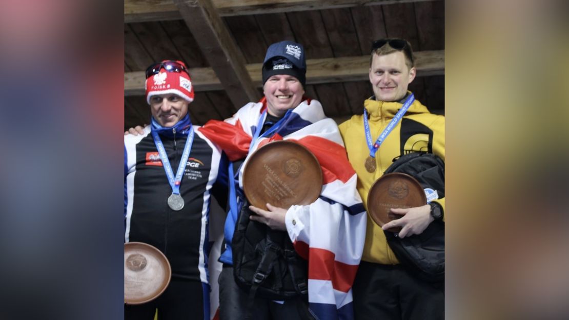 Hodgson celebrates winning gold on snow at Zuberec, Slovakia in 2020.