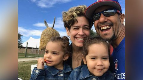 Melanie Lopez, seen here with her family, says she feels "in limbo" about Chicago Public schools returning to in-person learning.