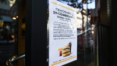 A sign outside a McDonald's restaurant, in Tokyo, Japan on Dec. 29, 2021. The fast food giant said last month that it would only offer small sizes of French fries after flooding at a Vancouver port and the Covid-19 pandemic cut off key supplies for the staple menu item. 