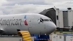 Unruly passenger on American Airlines flight from Honduras after storming the cockpit.