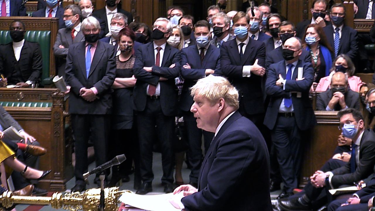 British Prime Minister Boris Johnson faced tough questions from lawmakers in Parliament as outrage mounts over a "bring your own booze" event held at Downing Street during the height of the UK's first Covid-19 lockdown.