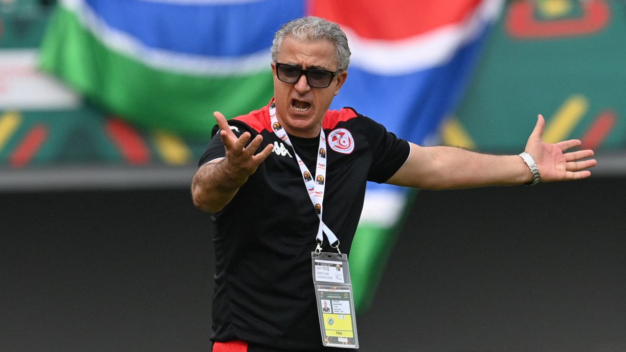 Tunisia's coach Mondher Kbaier gestures during the Group F match.