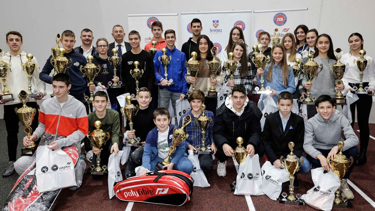 Djokovic is pictured at a tennis awards ceremony the day after testing positive for Covid-19. 