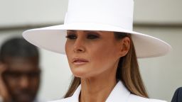 First lady Melania Trump waits with President Donald Trump to greet French President Emmanuel Macron and his wife Brigitte Macron during a State Arrival Ceremony on the South Lawn of the White House in Washington, Tuesday, April 24, 2018. (AP Photo/Carolyn Kaster)