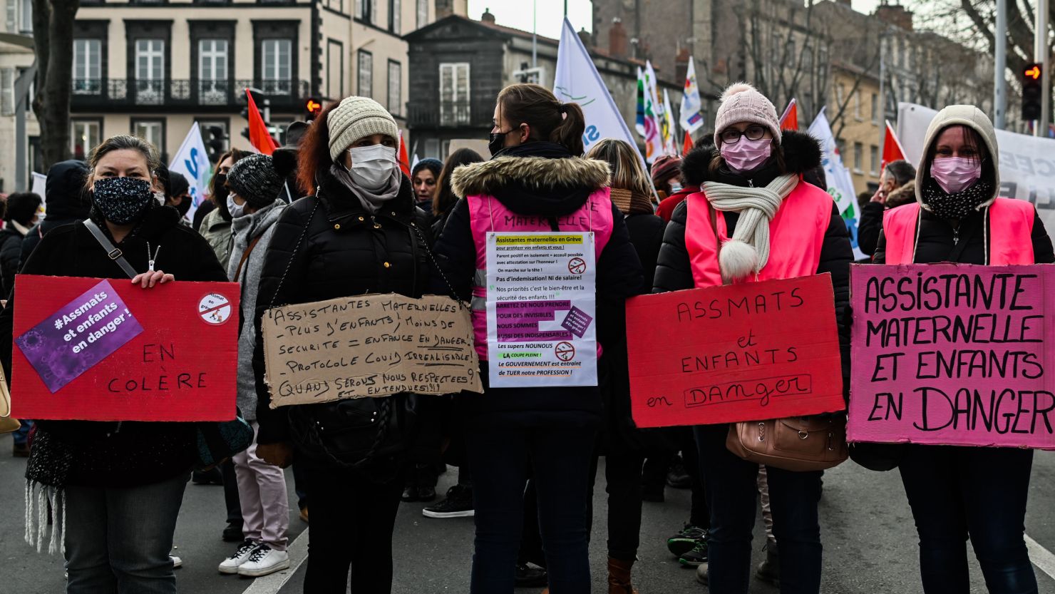 Demonstrators gather in the city of Clermont-Ferrand on Thursday as French teacher and student unions call for a national strike in protest over the government's Covid-19 protocols for schools.