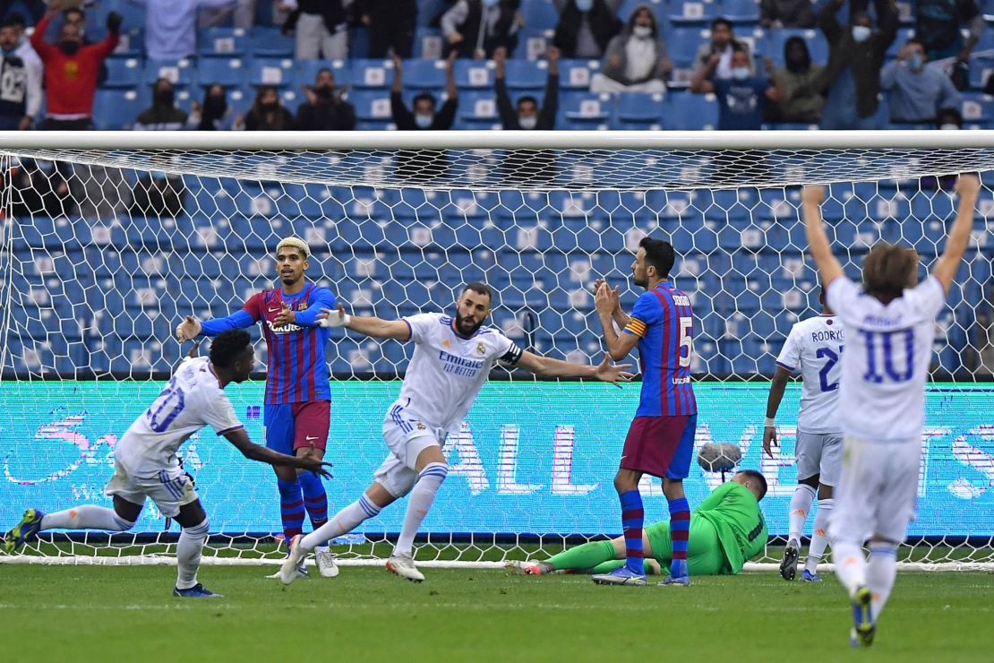 Karim Benzema celebrates after putting Real Madrid 2-1 up.
