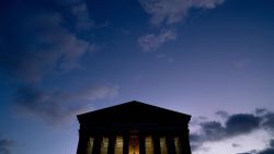 Clouds are seen in the sky above the US Supreme Court at dusk in Washington, DC on January 11, 2022.