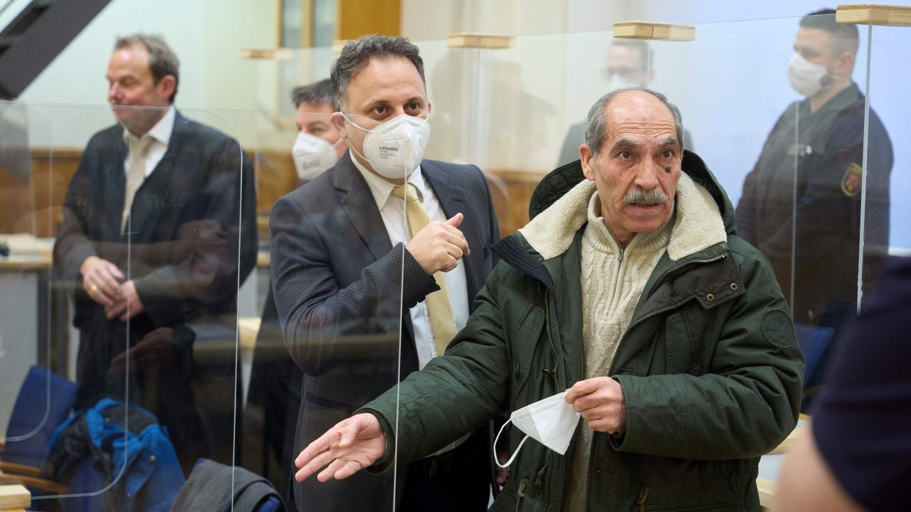 Former Syrian intelligence officer Anwar Raslan, is pictured next to his lawyers in the courtroom at a courthouse in Koblenz, western Germany, on January 13, 2022 on the last day of his trial where he was sentenced to life in jail for crimes against humanity.