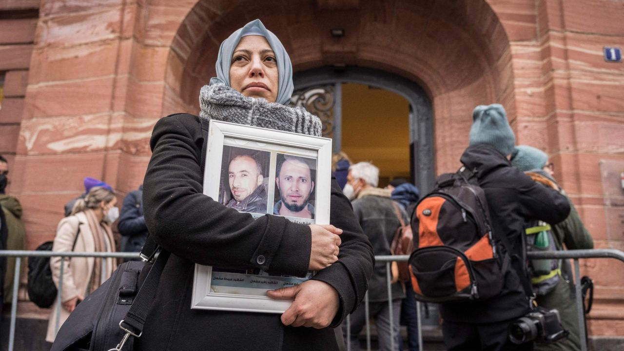 Yasmen Almashan, a Syrian campaigner for the Caesar Families Association, waits outside the courthouse in Koblenz, western Germany on Thursday.