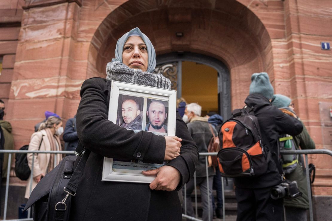 Yasmen Almashan, a Syrian campaigner for the Caesar Families Association, waits outside the courthouse  in Koblenz, western Germany on Thursday.