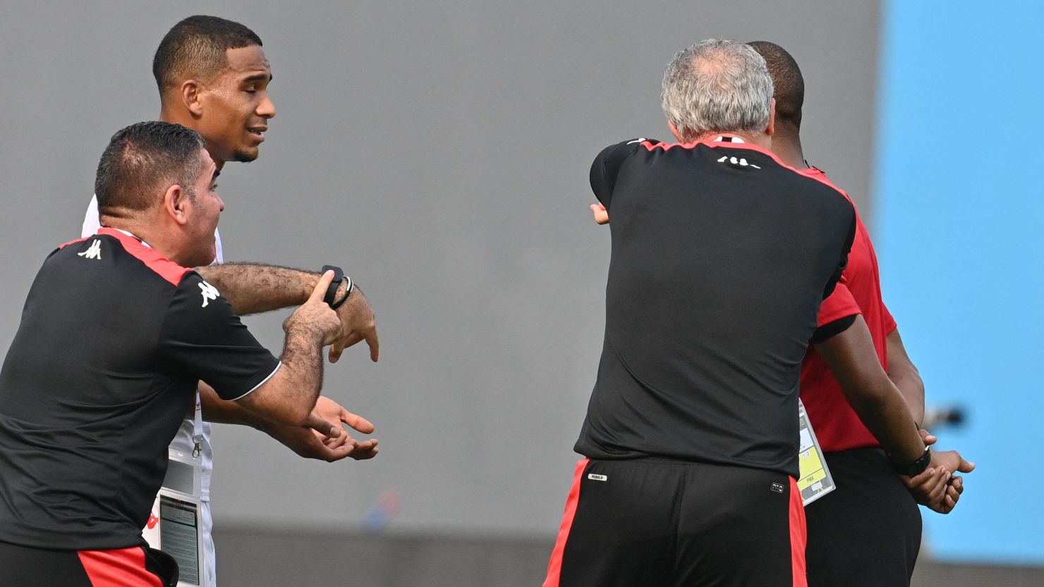 Tunisia's coach Mondher Kebaier (right) remonstrates with referee Janny Sikazwe. 