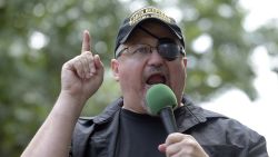 In this Sunday, June 25, 2017 file photo, Stewart Rhodes, founder of the citizen militia group known as the Oath Keepers speaks during a rally outside the White House in Washington.