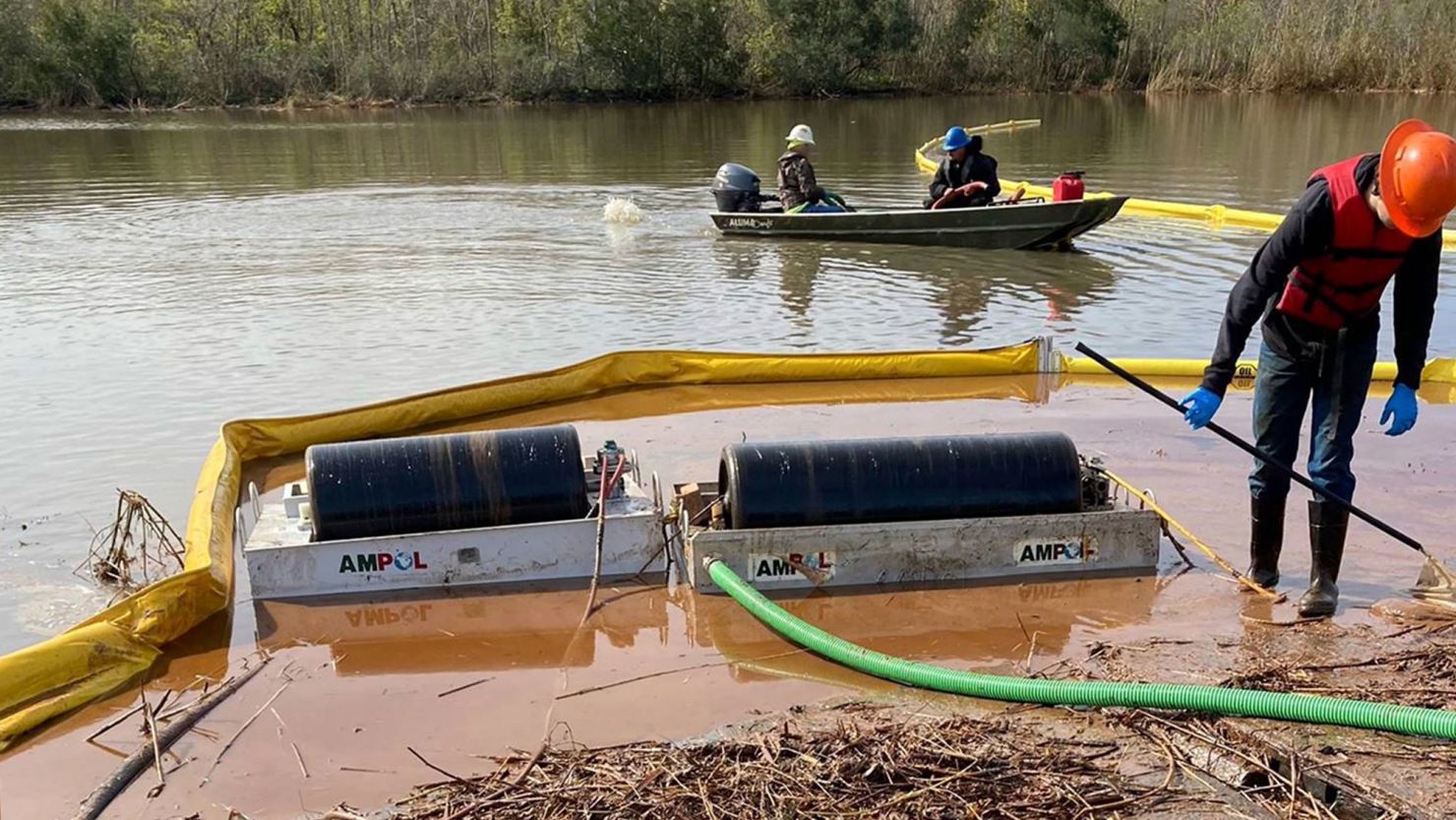 Cleanup work is seen at the site where more than 300,000 gallons of diesel spilled on December 27, 2021, just outside New Orleans.