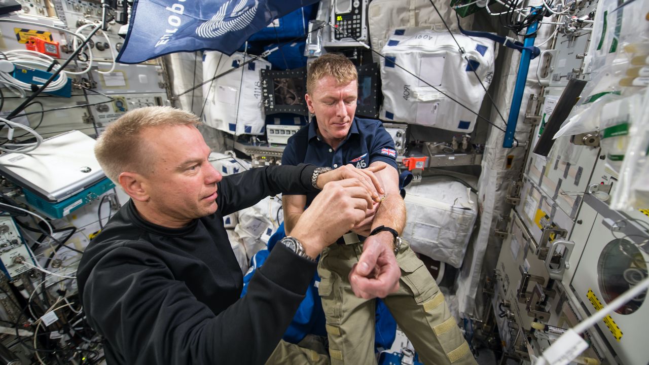 European Space Agency astronaut Tim Peake is shown after his first blood draw was completed in space.