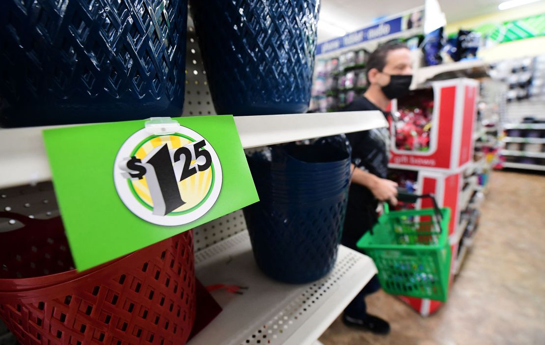 A sign displaying $1.25 price is posted on the shelves of a Dollar Tree store in Alhambra, California, December 10, 2021.