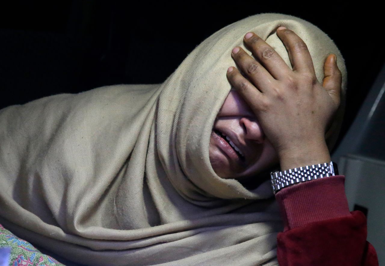 A woman cries inside an ambulance in Murree, Pakistan, after a family member died during a blizzard on Saturday, January 8. <a href="https://www.cnn.com/2022/01/08/asia/pakistan-muree-snowstorm-death-intl/index.html" target="_blank">At least 21 people died</a> after thousands of vehicles became stranded in northern Pakistan.
