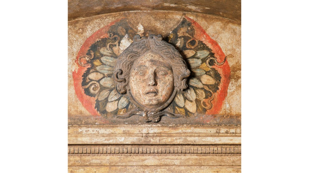 <strong>Sole outsider: </strong>The gorgon is the only element not dug out from the hillside; instead it was carved and mounted on the wall.