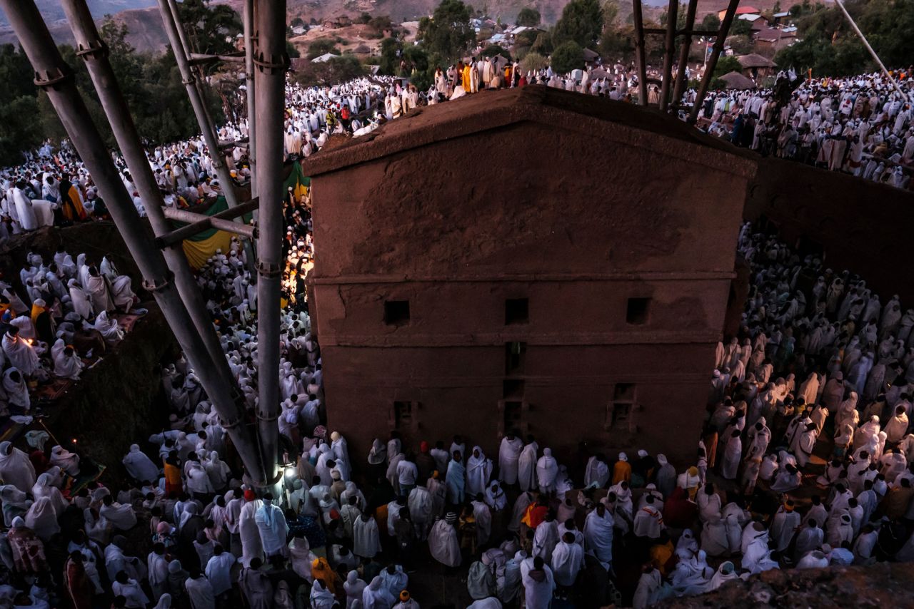 Pilgrims attend the celebration of Genna, the Ethiopian Orthodox Christmas, at St. Mary's Church in Lalibela, Ethiopia, on Friday, January 7. The holy site was under rebel control just weeks ago, but it was retaken by government forces in late December.