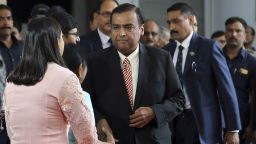 Chairman of Reliance Industries Limited Mukesh Ambani, center, arrives for the Annual General Meeting of Reliance Industries Limited in Mumbai, India, Monday, Aug. 12, 2019. (AP Photo/Rajanish Kakade)