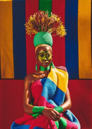 Known as the "Ndebele Superhero," Masombuka uses her art to spark conversations about culture and identity, often featuring the vibrant, colorful beadwork.