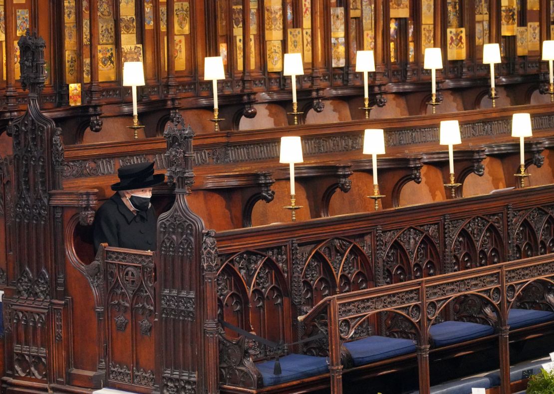 Queen Elizabeth II takes her seat during the funeral of Prince Philip.