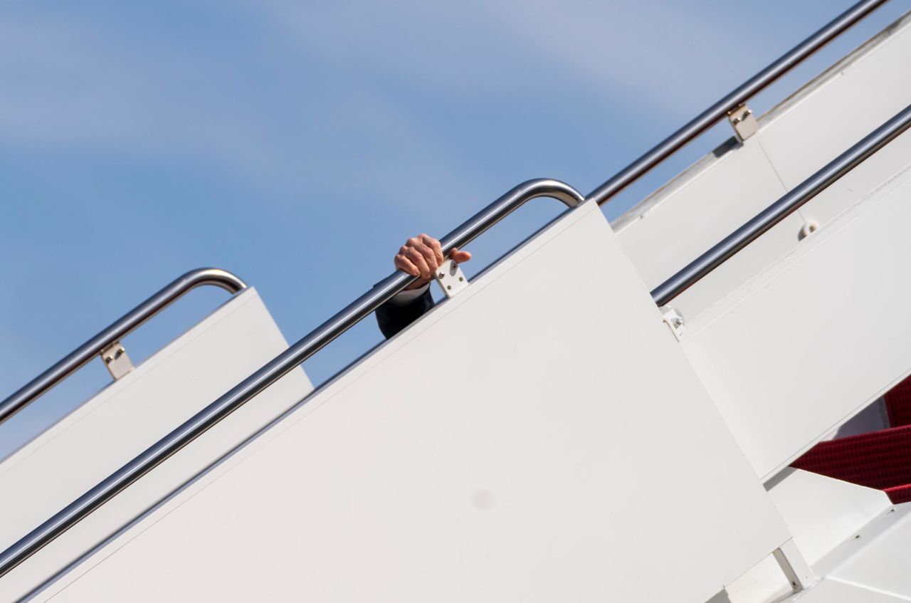 <a href="https://www.cnn.com/2021/03/19/politics/biden-air-force-one-trip/index.html" target="_blank">Biden trips</a> as he walks up the steps of Air Force One on March 19. <br /><br />"I've walked up those steps before, and they are steep and long," New York Times photographer Doug Mills said. "On this very windy day, President Biden started walking up the steps and then a few steps later he began jogging. He stumbled and recovered, then stumbled again and recovered, and then finally fell to one knee and was down on the steps with just his right hand holding onto the railing. He quickly popped back up and finished his climb into the plane.<br /><br />"I was pretty shocked at what had happened, but given the windy conditions and the slight movement in the stairs, it's completely understandable."