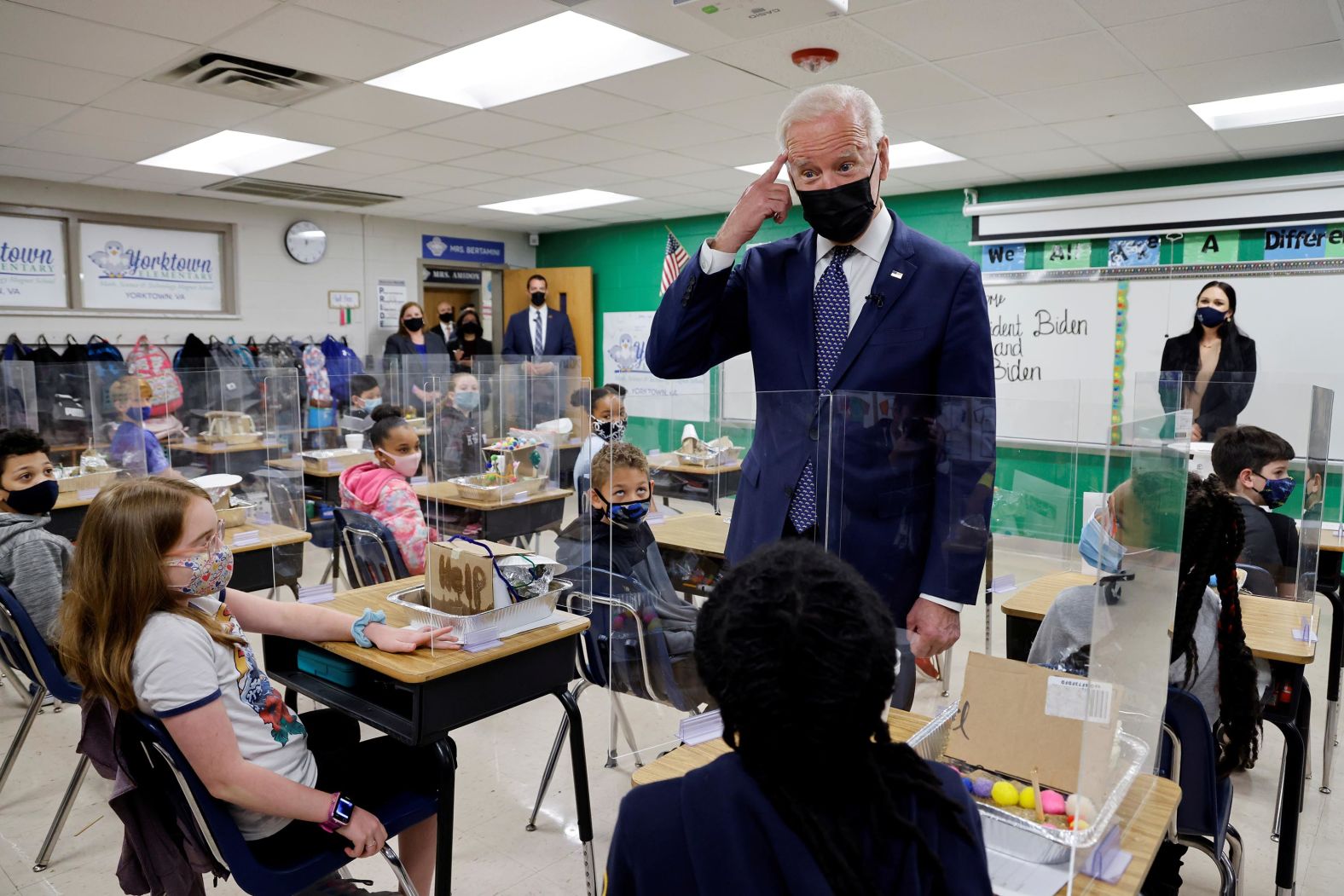 Biden points to his hair on May 3 after a student in Yorktown, Virginia, told him she wanted to be a hairstylist when she grows up.<br /><br />Biden and the first lady also visited a community college in Virginia <a href="https://www.cnn.com/2021/05/03/politics/biden-economic-proposals-virginia-schools/index.html" target="_blank">to promote his sweeping economic proposals</a> and how they would benefit schools if signed into law.<br /><br />He touted his $1.8 trillion American Families Plan as "a once-in-a-generation investment in our families, in our children, that addresses what people care most about and most need: the investment we need to win the competition, the competition with other nations in the future."