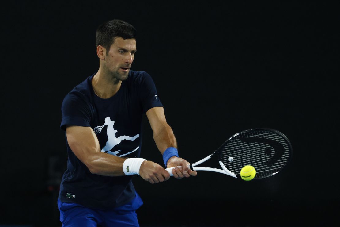 Novak Djokovic plays a backhand during a practice session ahead of the 2022 Australian Open.