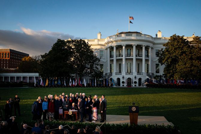 Biden signs <a href="https://www.cnn.com/2021/11/05/politics/house-votes-infrastructure-build-back-better/index.html" target="_blank">the infrastructure bill</a> into law during a November 15 ceremony on the South Lawn of the White House. <br /><br />The $1.2 trillion legislation focuses on infrastructure such as roads and bridges.<br /><br />"This moment was the pinnacle of what (Biden) spent the first year of his presidency working on: Infrastructure," photographer Al Drago said. "It was toward the end of a long and cold day in Washington, and the wind was whipping in a winter-is-coming kind of November way."