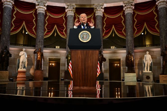 Biden speaks from the US Capitol's Statuary Hall on January 6 to mark the one-year anniversary of the <a href="https://www.cnn.com/2022/01/03/politics/gallery/january-6-capitol-insurrection/index.html" target="_blank">Capitol riot. </a>It has now been more than a year since supporters of Donald Trump breached the Capitol, attacking officers and destroying parts of the building in what was a stunning display of insurrection. <br /><br />In his remarks, Biden forcefully called out Trump for attempting to undo American democracy. "For the first time in our history, a President had not just lost an election. He tried to prevent the peaceful transfer of power as a violent mob reached the Capitol," Biden said. "But they failed. They failed. And on this day of remembrance, we must make sure that such an attack never, never happens again."<br /><br />This photo was taken by Jim Watson, who works for the wire service Agence France-Presse and was also in Biden's press pool when the riot was taking place last year.<br /><br />"I felt incredibly lucky that I was with him both days recording each historic event," Watson said. "This photo, to me, is proof that our democracy has survived and moved on from that day but has not forgotten it."