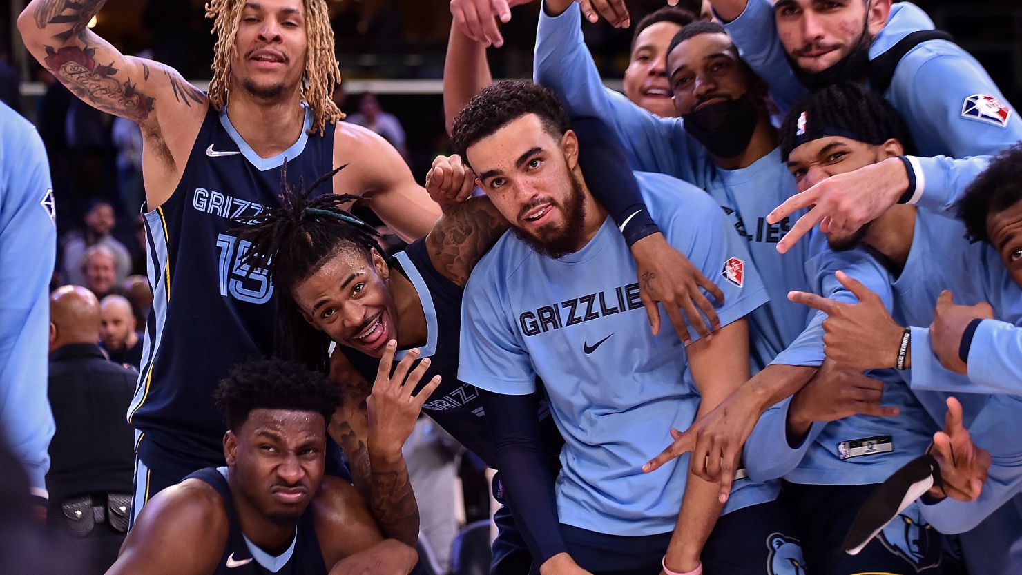 The Memphis Grizzlies pose for a photo after the game against the Minnesota Timberwolves.