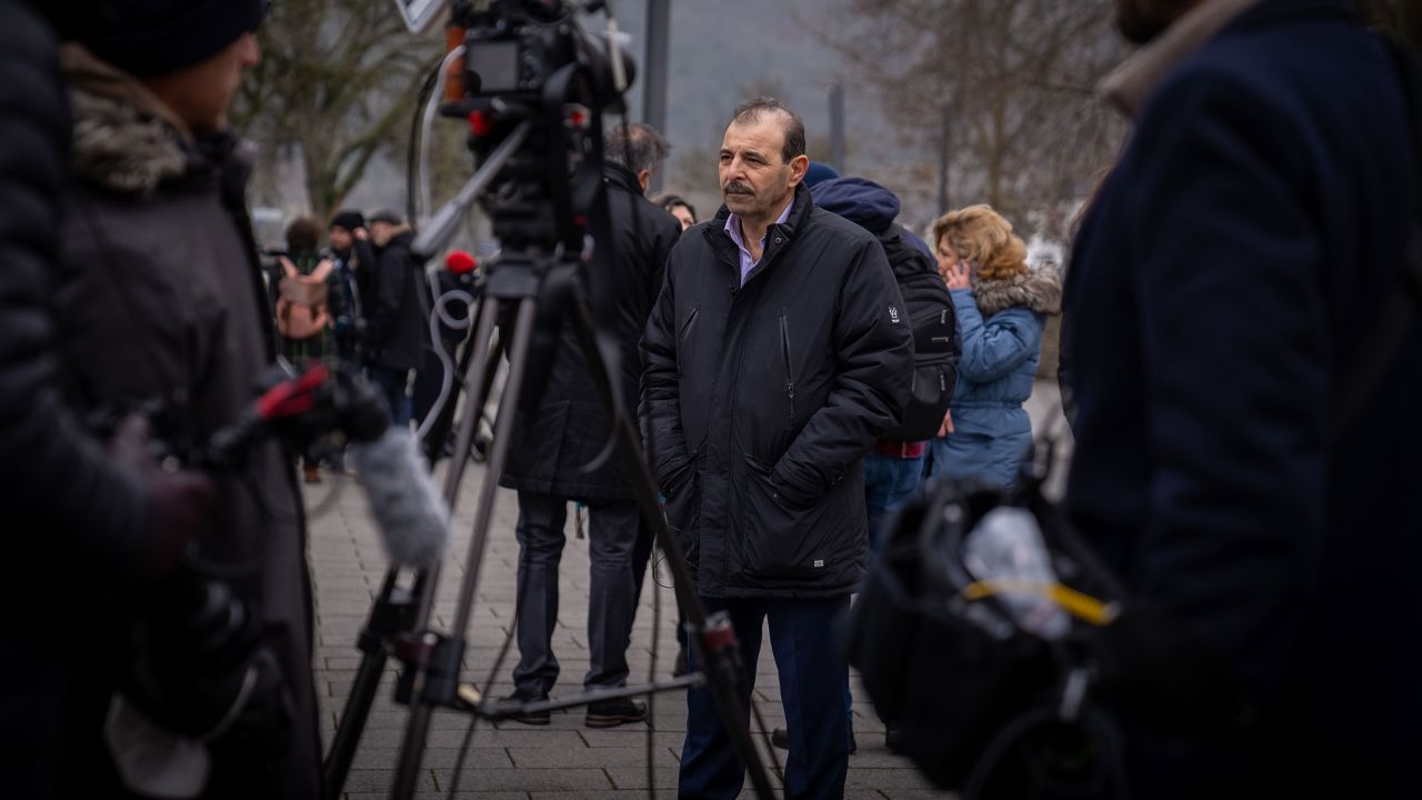 Syrian human rights lawyer Anwar al-Bounni stands outside the courtroom in Koblenz.
