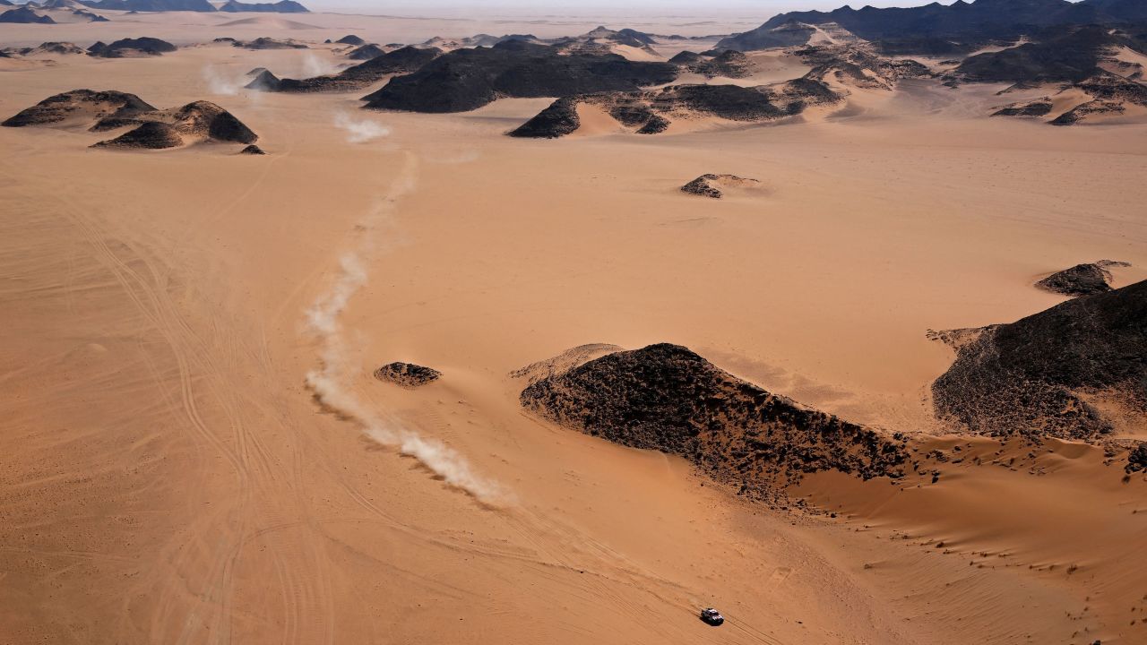A car is driven in Stage 9 of the Dakar 2022 around Wadi Ad Dawasir in Saudi Arabia. 