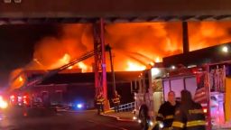 A large fire burns at the Qualco Chlorine building in New Jersey on Friday