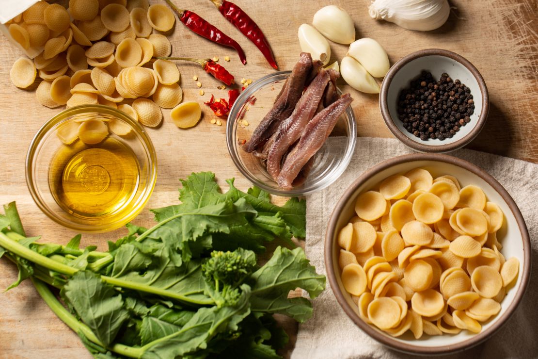 Orecchiette is paired with broccoli rabe, a little olive oil, garlic, pepperoncini and preserved anchovies.