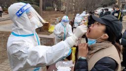 Residents take the sixth round of nucleic acid tests in Anyang, Henan Province, January 16, 2022.