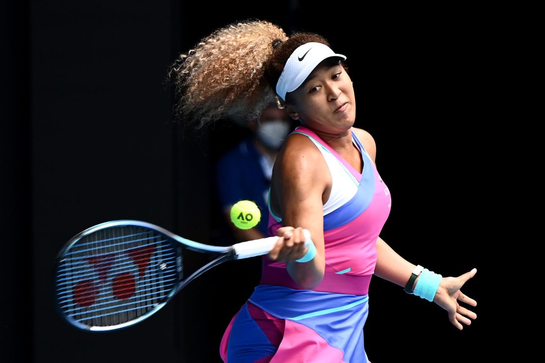 Osaka plays a forehand against Osorio during their women's singles match on day one of the Australian Open.